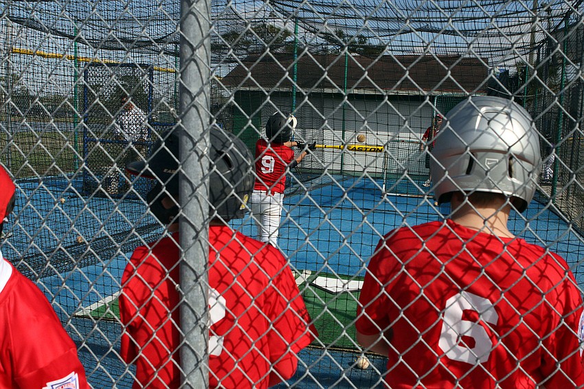 Players get a chance to work on their swings before the first games of the Spring season.
