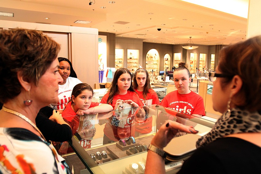 Susan Brothers talks to the girls about Michelle watches and how to present jewelry properly.
