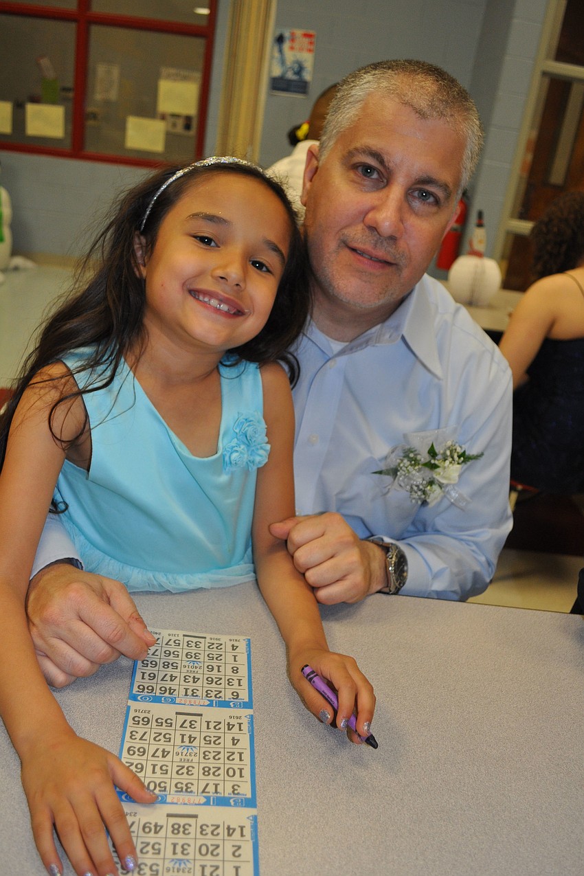Micaela Castro played bingo with her dad, Mike Giampoala