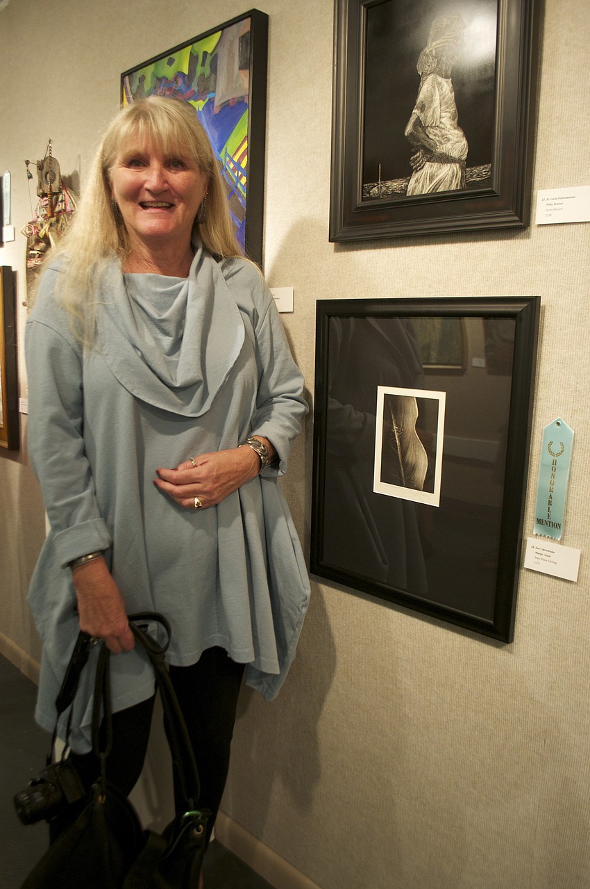 Margo Cook with her piece â€œEveâ€™s Wardrobeâ€ featured in â€œSimply Originalâ€ in Gallery 4