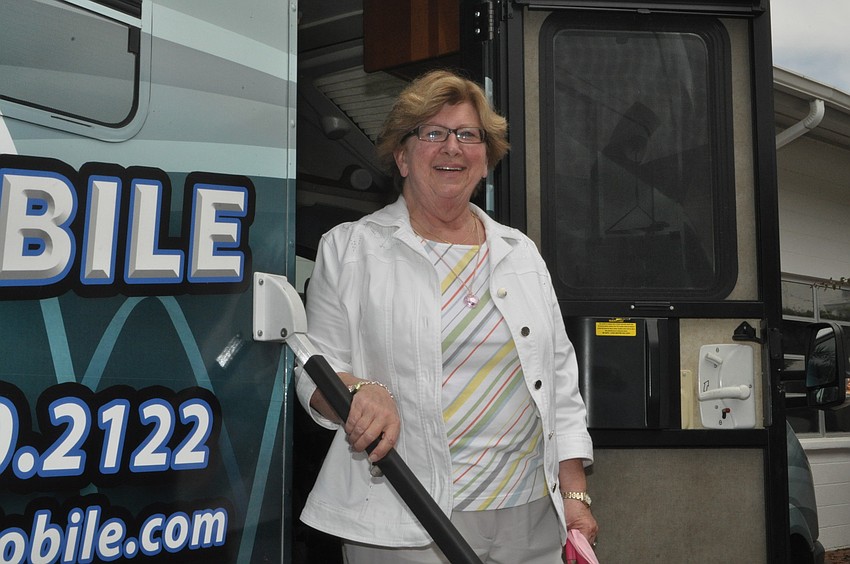 Connie Haas has her hearing tested.