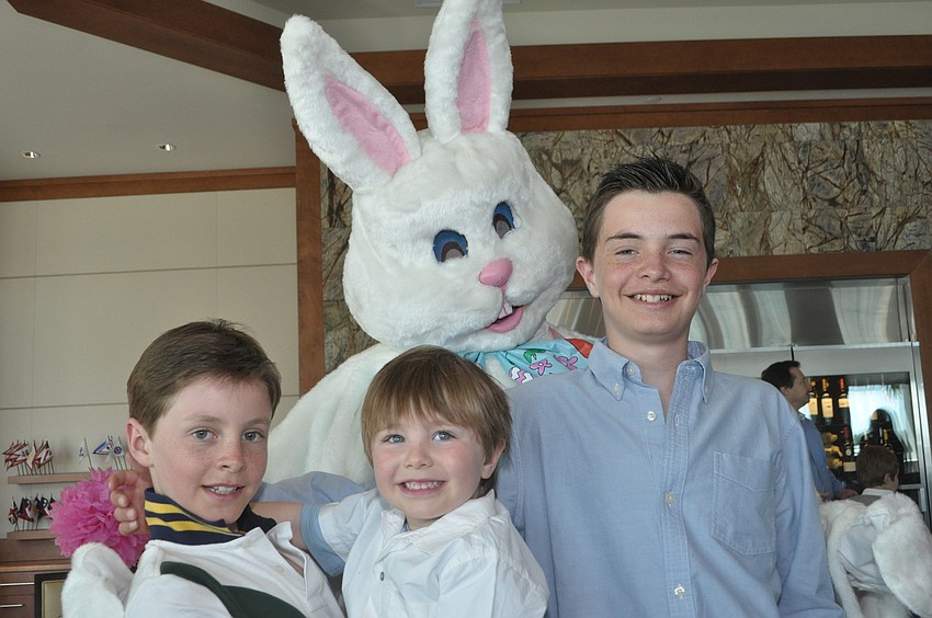 Antoine, 11, Alex, 4, and Mathieu Morneau Delarue, 12