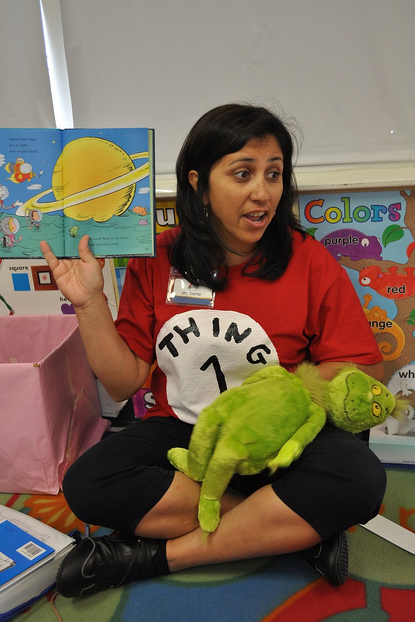 Dahlia Olvera reads Dr. Seuss to her classroom of 3 year olds.