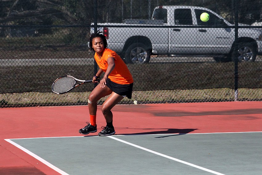 Sarasotaâ€™s Karis Powell prepares for a forehand shot.
