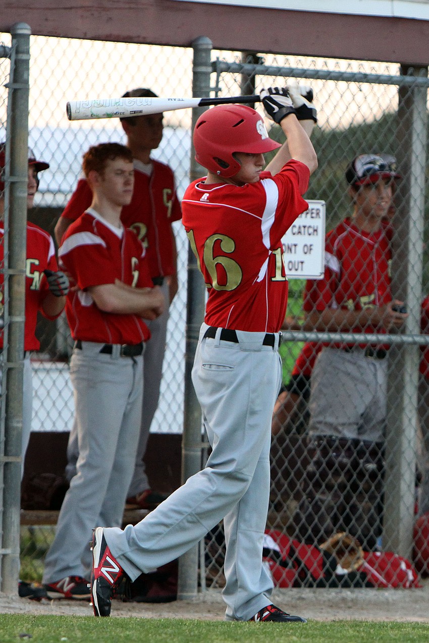 Cardinal Mooneyâ€™s Matt Quinlan, No. 16, warms up while on deck.
