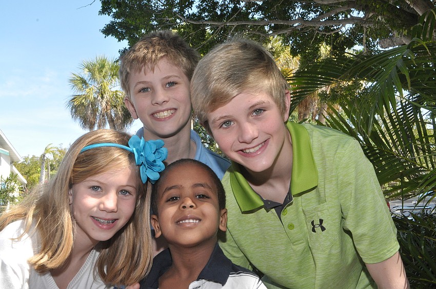 Liza, 8, Hayes, 10, Davis, 13 and Jax Goetcheus, 4, center