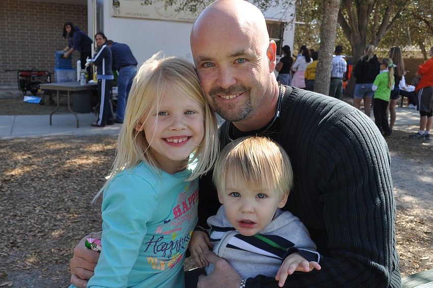 Mike Ryan enjoyed lunch with his children, Olivia and Michael.