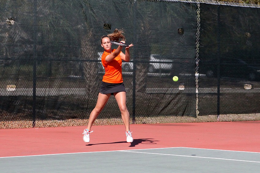 Sarasotaâ€™s Sarah Lumley follow through after hitting the ball.