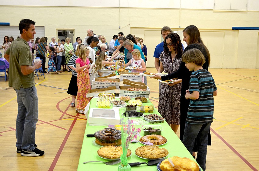Families enjoy an Easter breakfast.