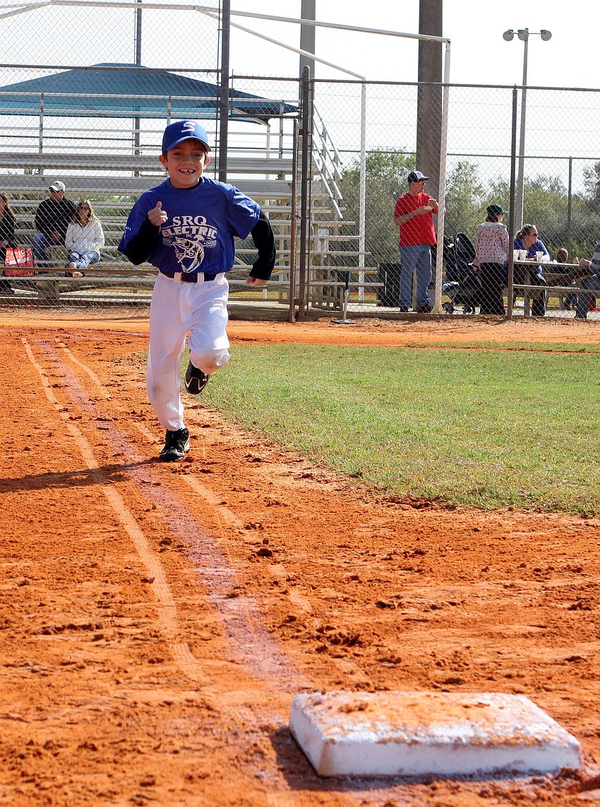 Chris DeMassa, 7, practices running the bases.
