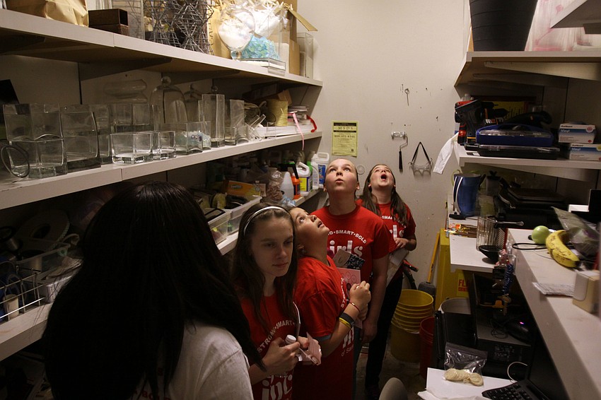 The girls look around Robert Roubideauxâ€™s prop room.