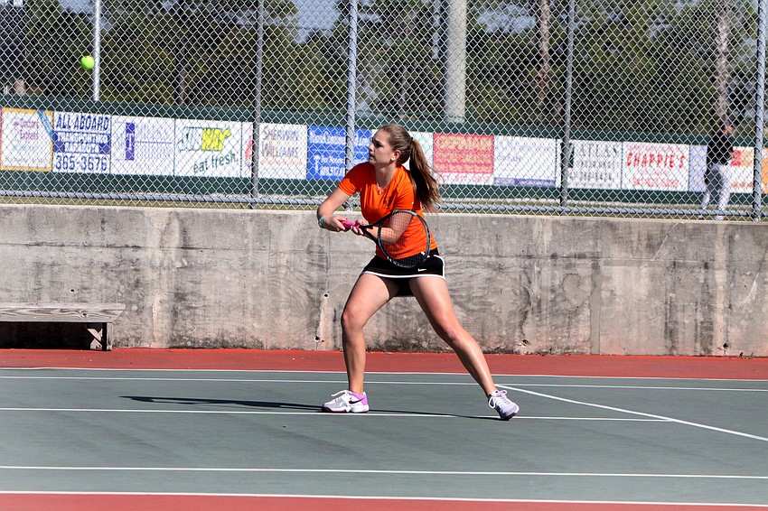 Sarasotaâ€™s Gabbi Holliday goes in for a short ball.