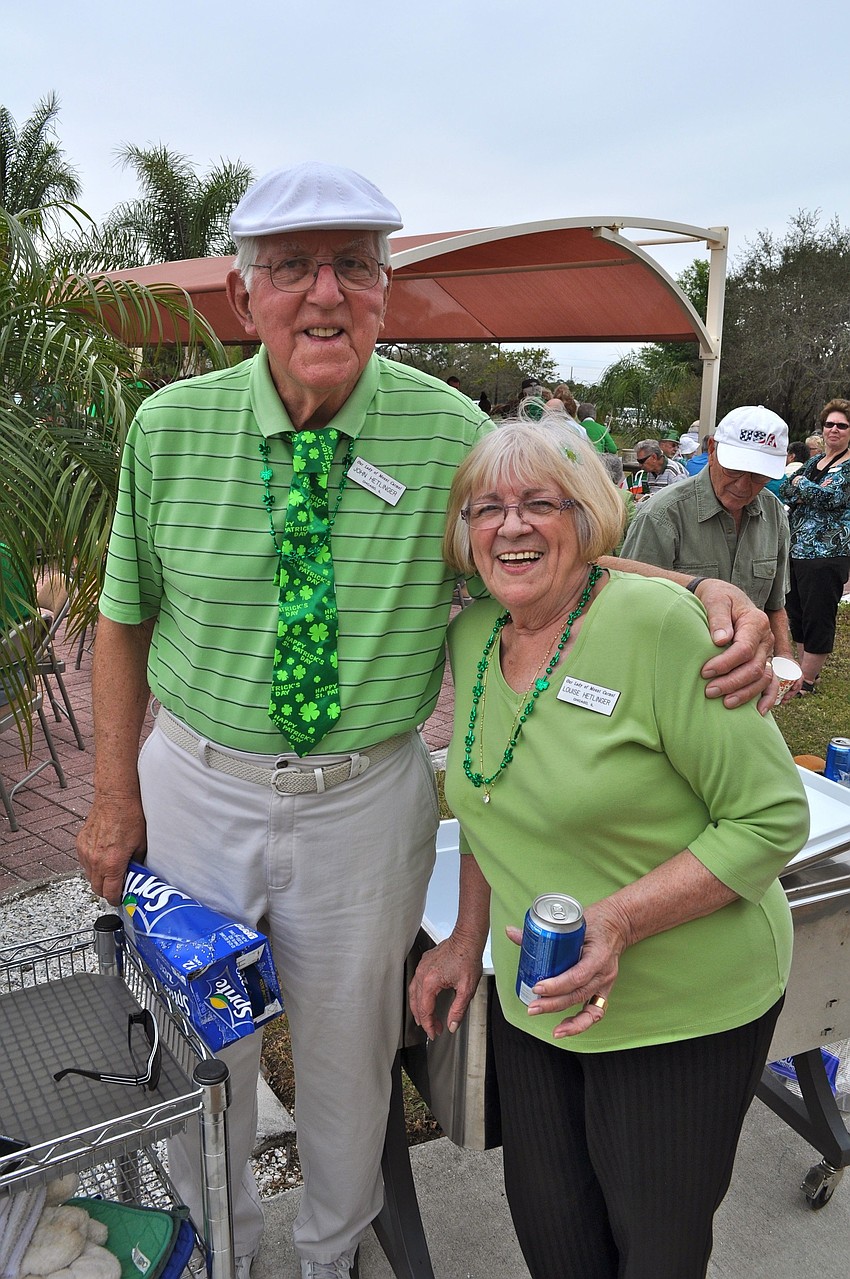 John and Louise Hetlinger wore their best green attire to the party at Our Lady of Mount Caramel Parish.
