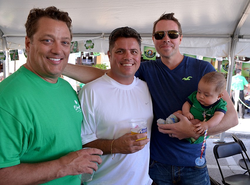 Mark Vandenbroek, Totte Adolfsson and Thomas Comingore with his son, Zeke.