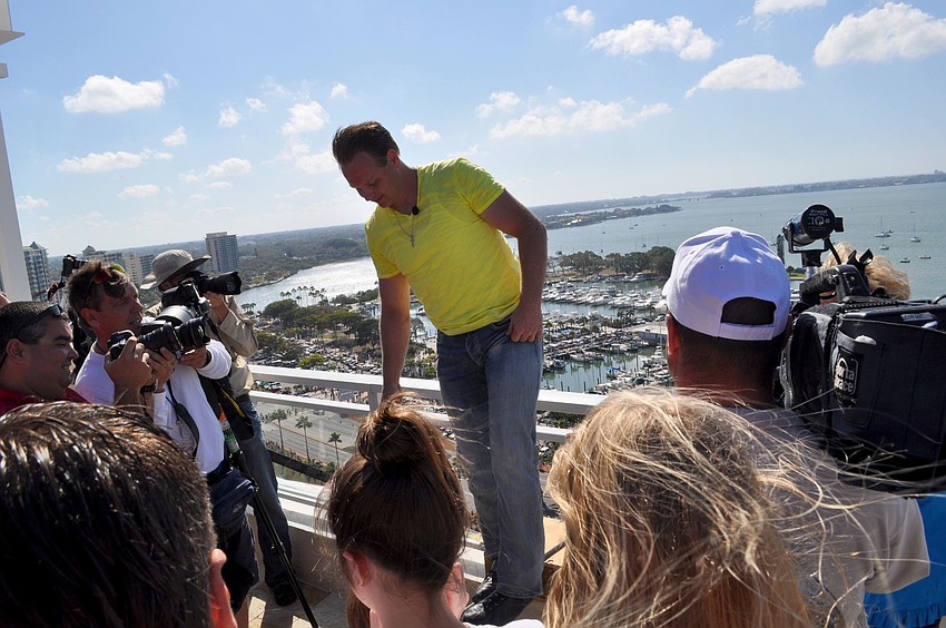Wallenda greets onlookers after completing his walk.