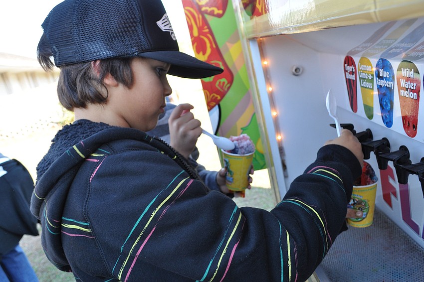 Justin Worley added all the flavors to his sno-cone, at the Tabernacle's Winter Wonderland.