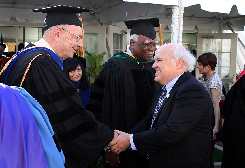 Dr. Donal Oâ€™Shea shook hands and was congratulated by faculty, alumni and students on his inauguration.