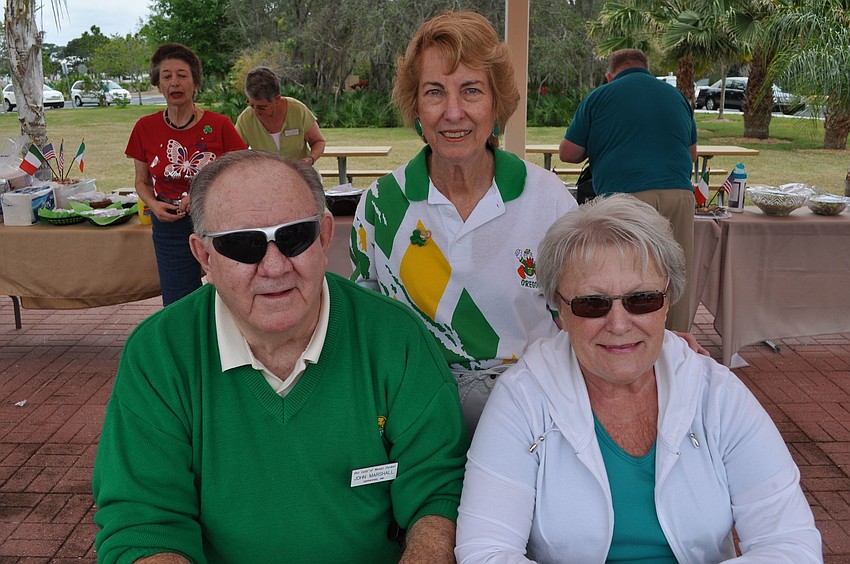 Carla Silva, center, with John and Fran Marshall