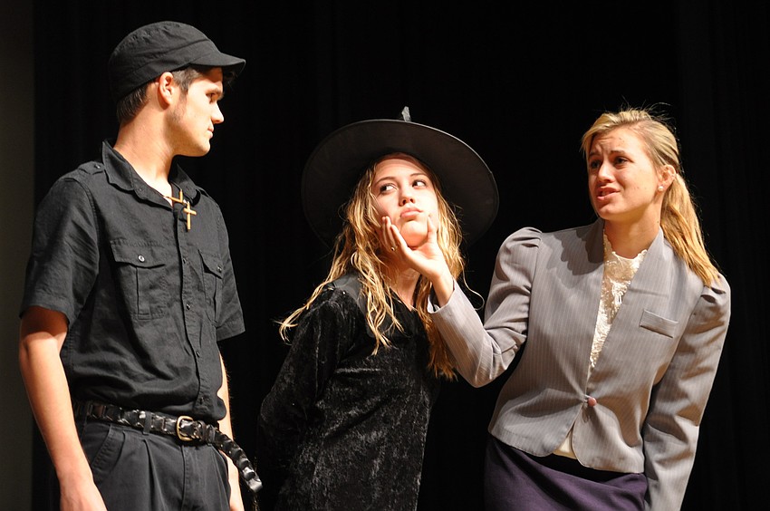 Michael Vanderford, playing Jack the bailiff, watched as MaKenna Chandler, the Wicked Witch, got scolded by Kayla Lindsay, the defense attorney.