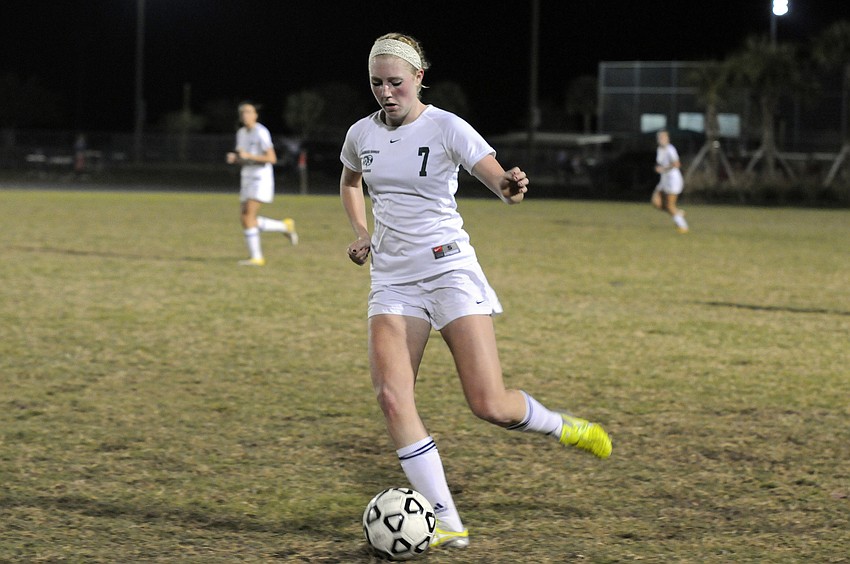 Lakewood Ranch midfielder Talia Falco dribbles the ball toward the outside.