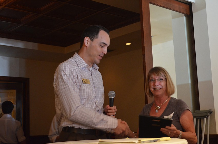 Kevin Cooper and 2012 Community Partner Debbie Szczesny of Jamaica Royale.
