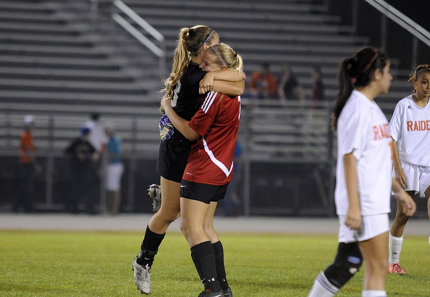 Lakewood Ranch midfielder Maria Miller and goalkeeper Alex Latham celebrate following Lakewood Ranchâ€™s 1-0 victory over Plant City in the Class 4A-Region 3 finals Jan. 29.