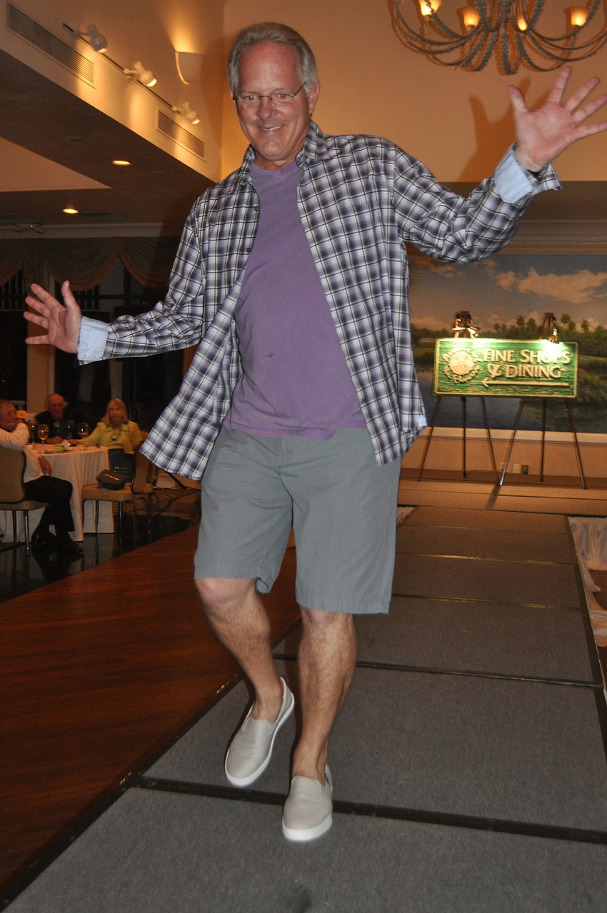 Michael Drake struts down the catwalk.