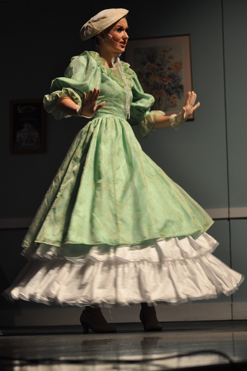 Mrs. Tottendale, played by Jillian Smith, gloats about how much she loves wearing a fancy dress.