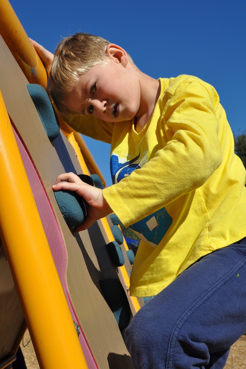 Billy Mallon, 5, conquered a climbing wall for the first time.