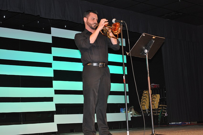 Luke Jones, a Braden River Middle School music teacher, played a trumpet solo.