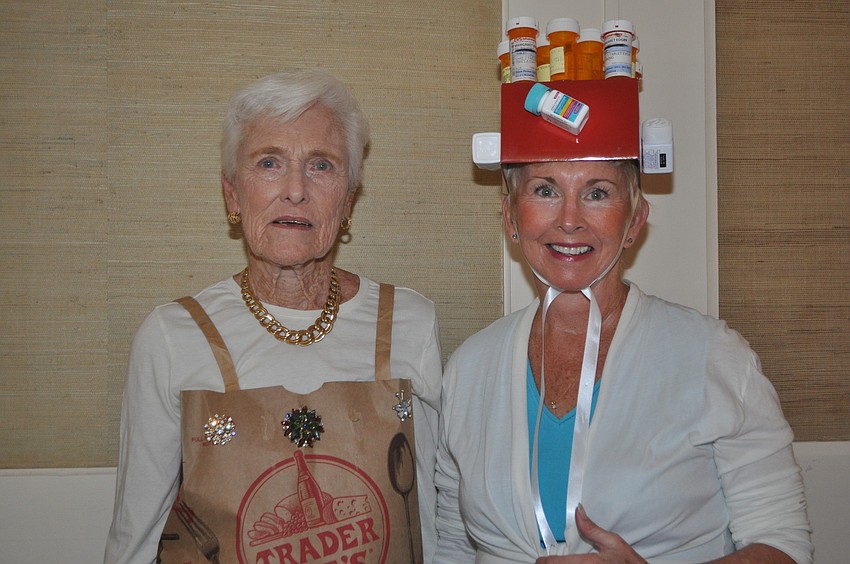 Marcia Deitrich and Sharyn Ford in a pillbox hat.