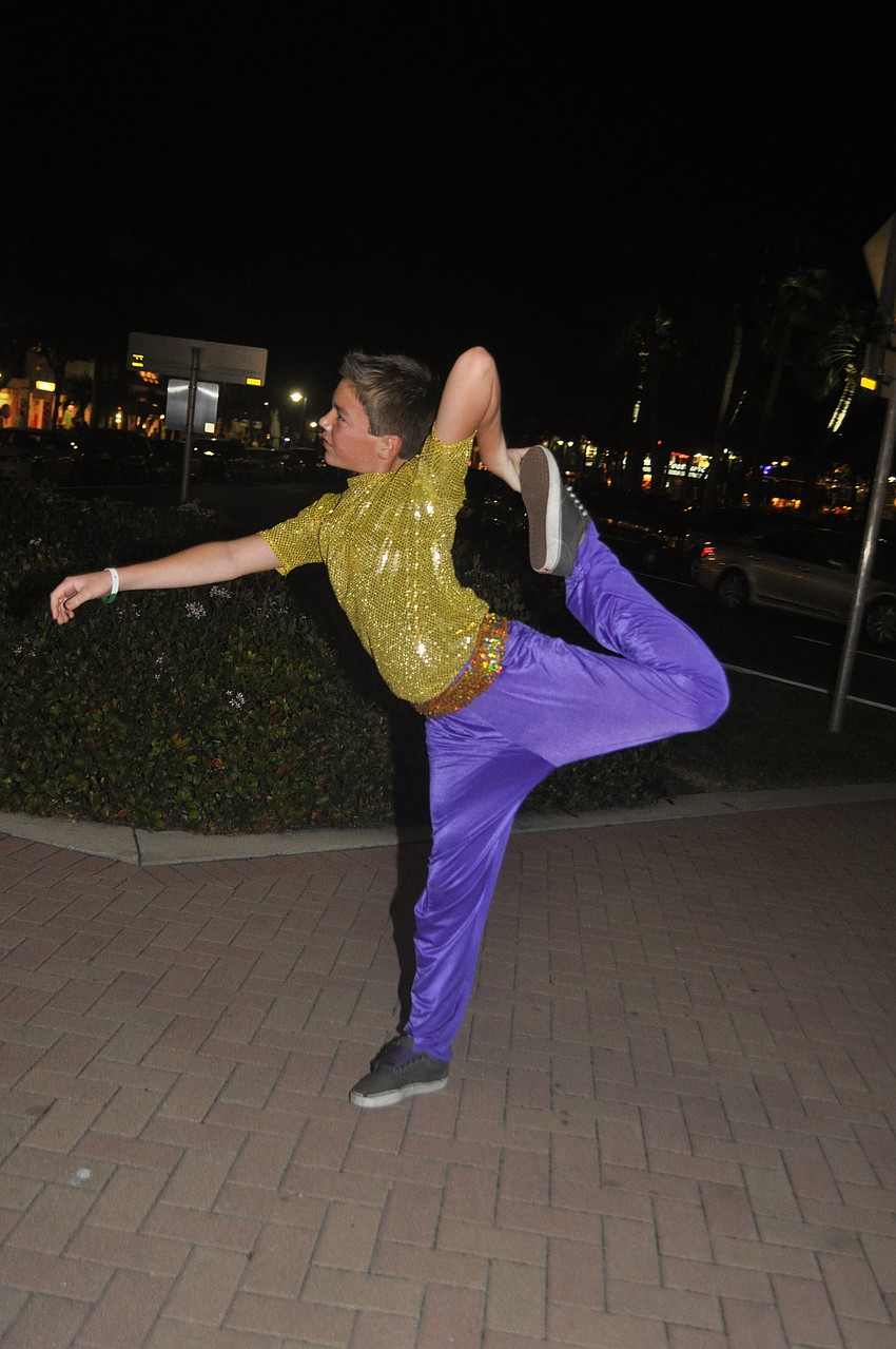 Sam Weatherwax, of Sailor Circus, does acrobatics in the Circle.