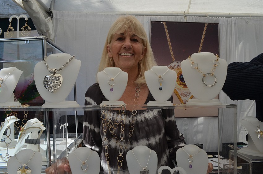 Maureen Shull and her husband Gary sell handcrafted Nina Nomi jewelry. Maureen started making jewelry in college as a hobby. After years of teaching high school she went back to her hobby of making jewelry.