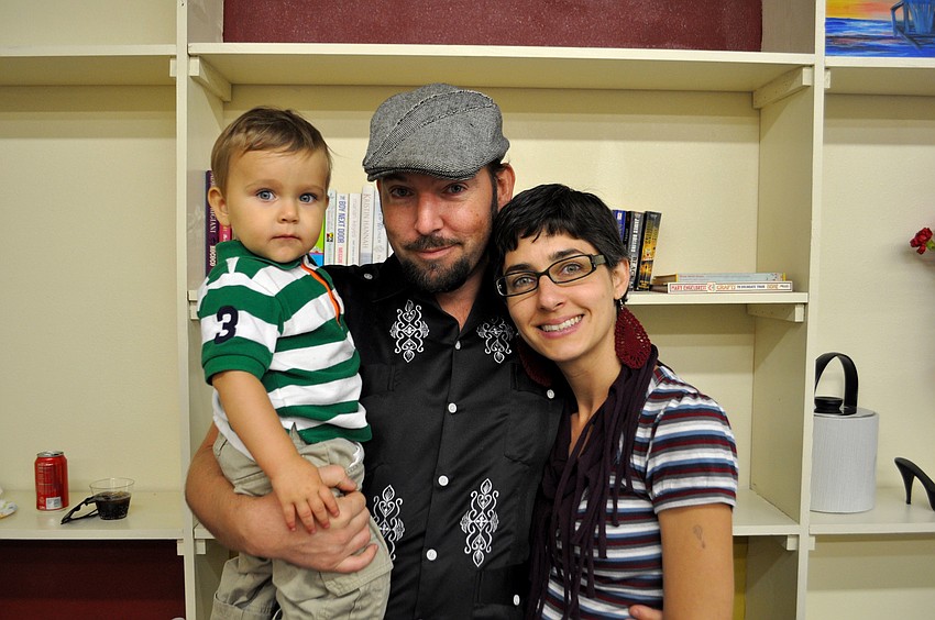 Artist, Truman Adams with his wife, Brandy and son, Sky.