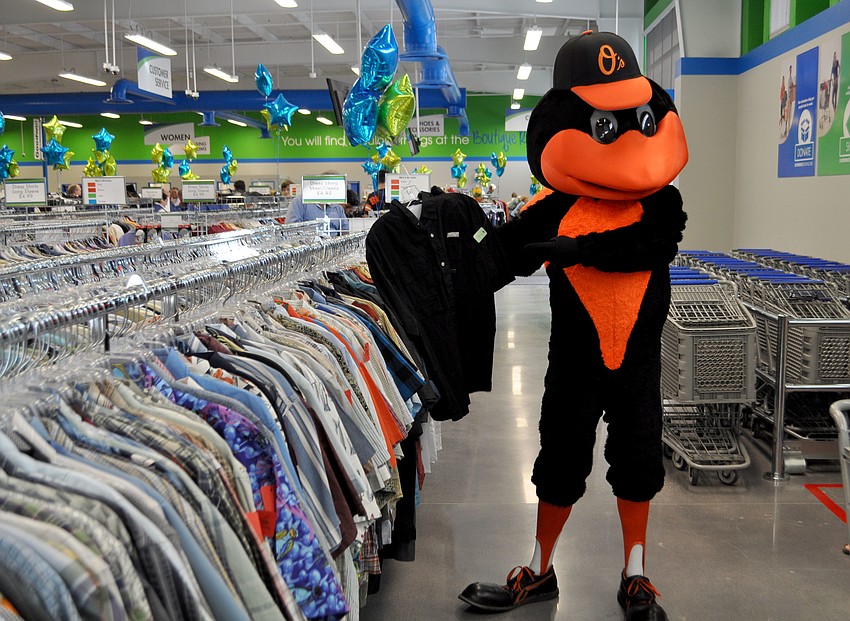 The Oriole Bird shows off the storeâ€™s new merchandise.