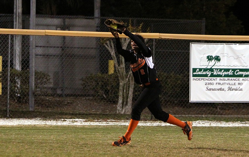 Sarasotaâ€™s Jami Aguayo, No. 2, makes an impressive catch in left field.