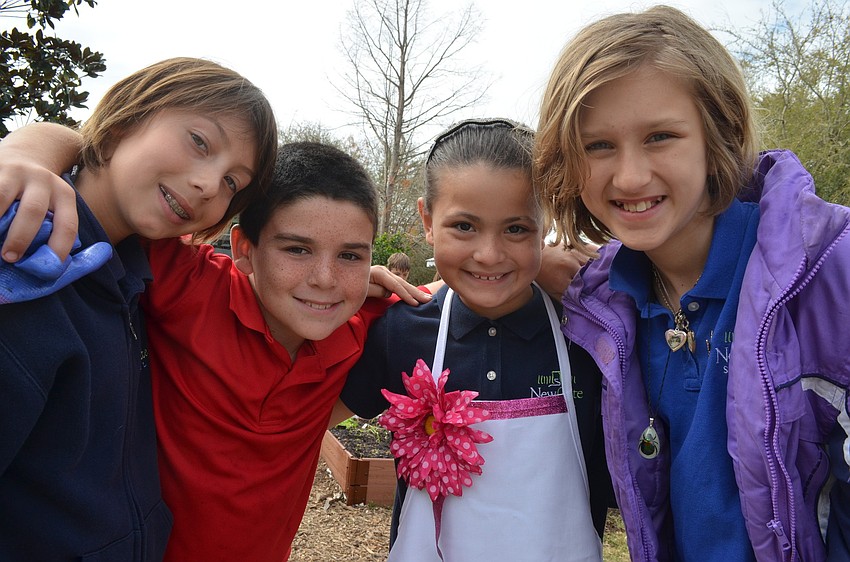 Students Andrew Florio, Aiden Pearson, Skyler Vargas and Bianca Drobny are excited about their new garden.