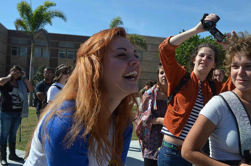 Sophomore Megan Adams finds out she won a 2002 Saturn SL that was donated by a family in the school.