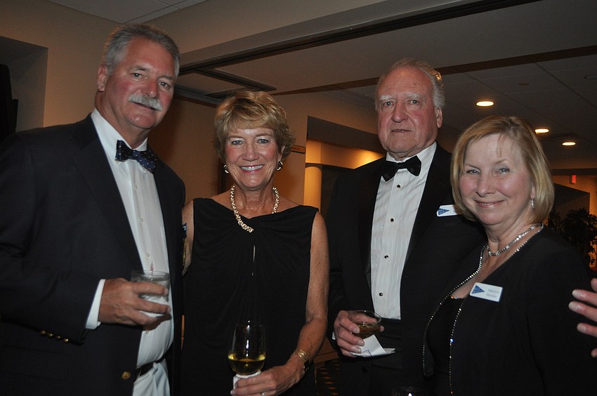 Whit and Cade Sibley with Jack and Marilyn Herider