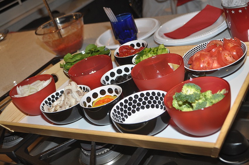 Guests made their own pizzas, choosing from 15 available toppings.