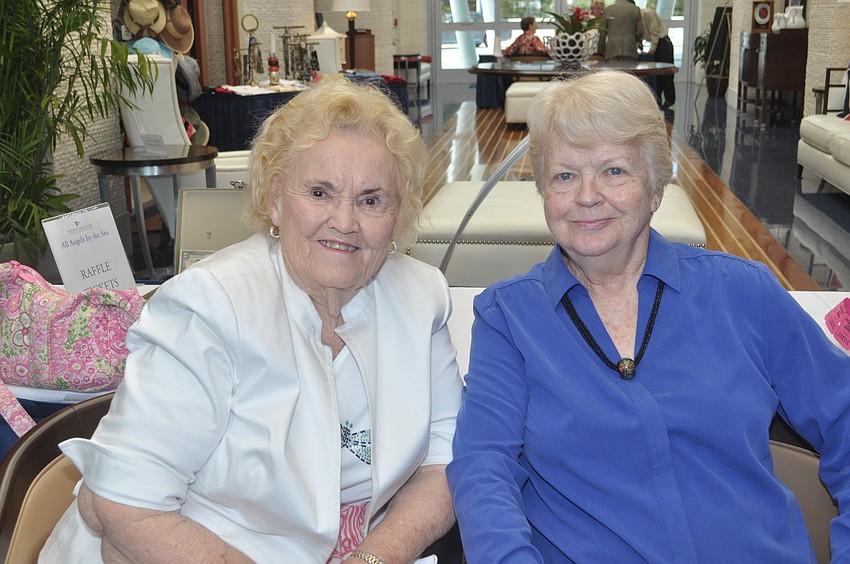 Beverly Sinclair and Carolyn Judd sell raffle tickets