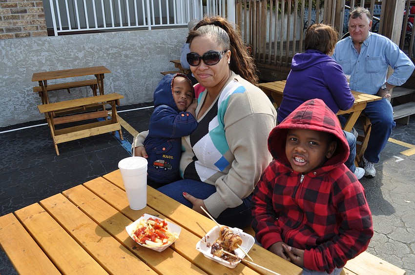 Elijah, Alaina and Samson Martinez ate Amish donuts