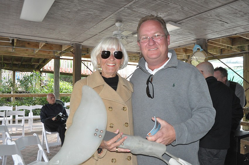 Barbi Nutting, of Save Our Seabirds, with Dan Strzempka, who made Winter the Dolphinâ€™s prosthetic tail.