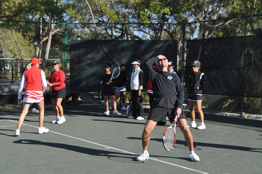 Milan Adrian reacts to hitting a ball in the net.