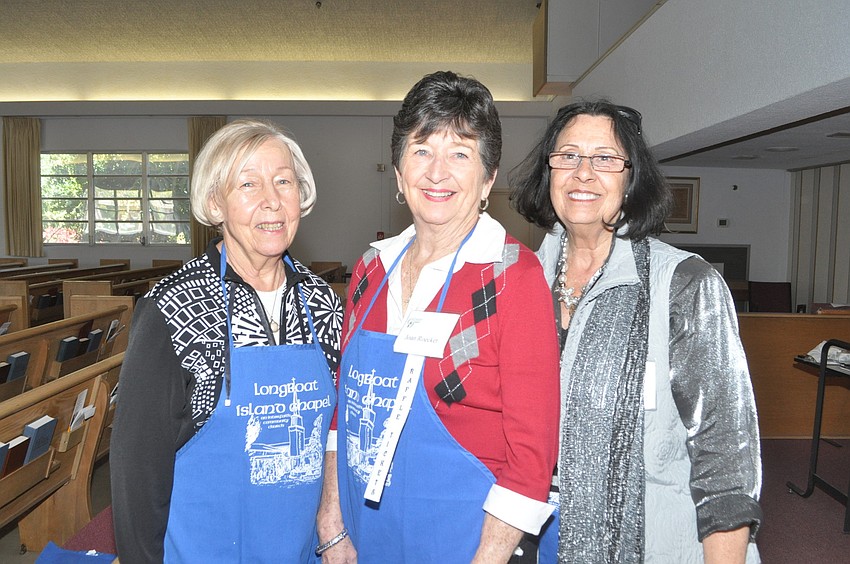 Hemma Fraser, Joan Roecker and Molly Carroll sell raffle tickets.