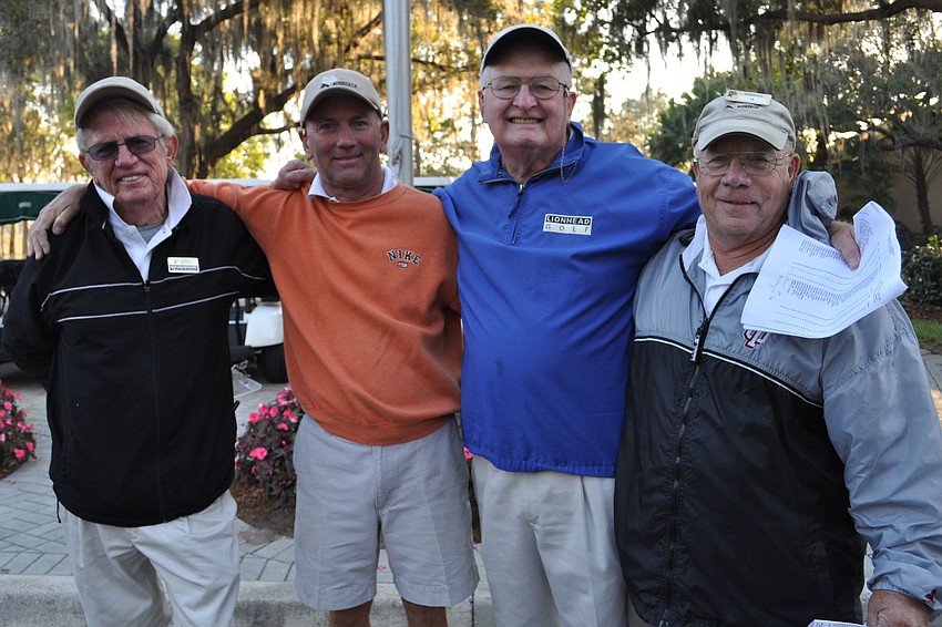 Al Packwood, Dennis Gallant, Louis Craig and Jim Fiedler served as golf cart attendants.