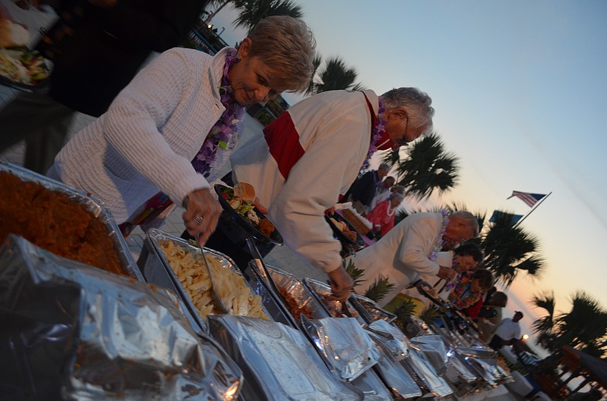 Residents enjoyed a dinner from Captain Curts, which included roast pig.