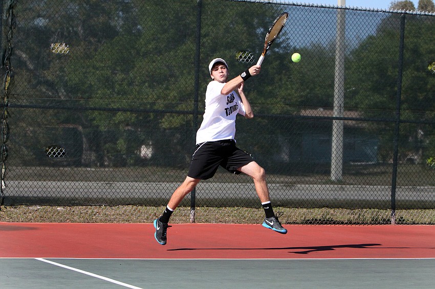 Sarasotaâ€™s Spencer Arias hits a forehand shot.