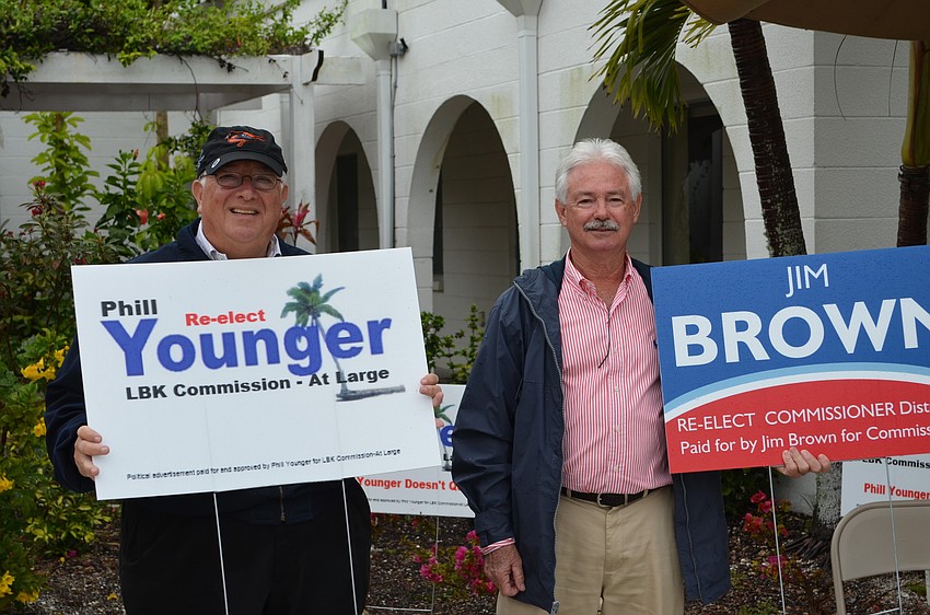 Commissioner Terry Gans, left, and Mayor Jim Brown, campaign at Longboat Island Chapel Tuesday morning.