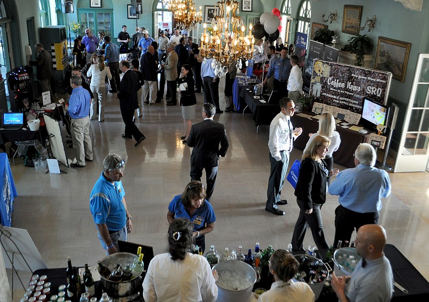 Chamber members browse various booths.